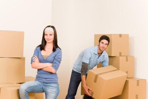 Supervisor checking complaint records for a removal service